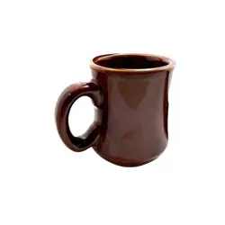OF BROWN CERAMIC