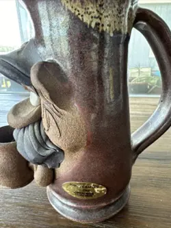 HOLDING MUG