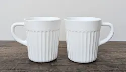 TWO VINTAGE WHITE