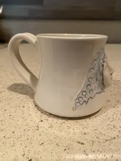 WITH HANDLE SIGNED
