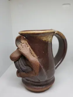 SCULPTED MAN FACE