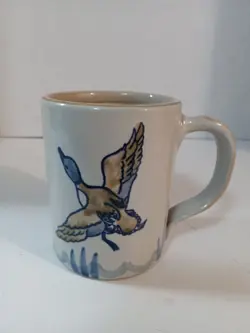STONEWARE MUG FLYING
