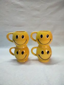 SET OF 4 VINTAGE MCCOY POTTERY SMILEY FACE MUGS