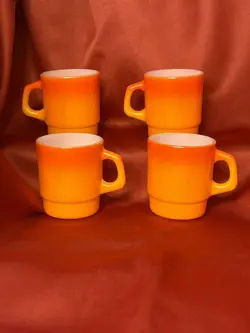 SET OF 4 VINTAGE FIRE KING ORANGE OMBRE STACKABLE MILK GLASS MUGS (SET OF 4)