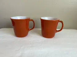 2 VINTAGE PYREX BURNT ORANGE AND WHITE MUGS, NO. 24