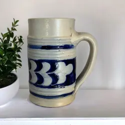 GLAZED POTTERY MUG.