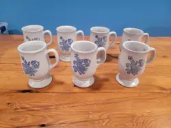 OF FOOTED CUPS/MUGS