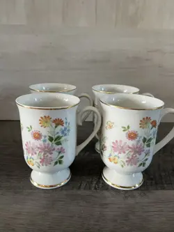 FOOTED PORCELAIN MUGS