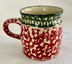 E.