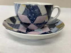 TEA CUP AND