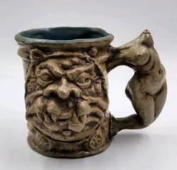 HANDLE FACE POTTERY