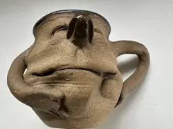 POTTERY FACE CUP
