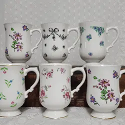 HANDLED PEDESTAL MUGS