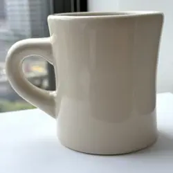 AT