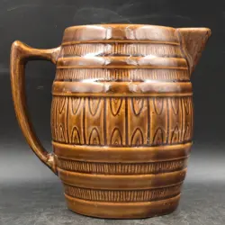 PITCHER AND