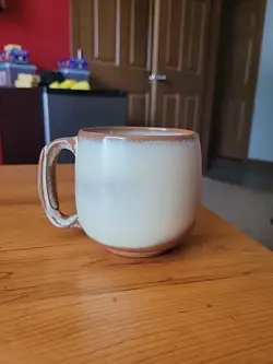 TAN CERAMIC MUG