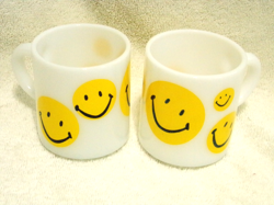 2 VINTAGE HAZEL ATLAS YELLOW SMILEY FACE MILK GLASS MUGS  CUPS  EUC