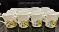 12 VINTAGE CORELLE SUNFLOWER COFFEE CUPS.