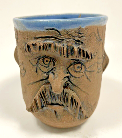 POTTERY SCULPTED MAN