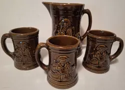 VINTAGE NELSON MCCOY BROWN BUCCANEER  POTTERY BARWARE, PITCHER AND THREE MUGS