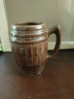 BROWN STONEWARE BARREL