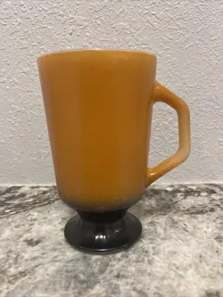VINTAGE FIRE KING COFFEE PEDESTAL MUG TWO TONED ORANGE BLACK