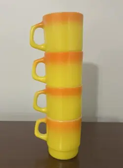 VINTAGE FIRE KING ORANGE YELLOW CANDY CORN MUGS SET OF 4 STACKING