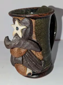 W/CIGARETTE MAHON STONEWARE
