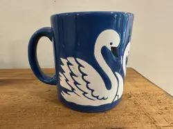 MUG W.