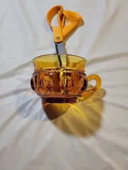 AMBER GLASS THUMBPRINT