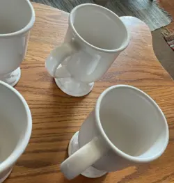 FOOTED MUG RETIRED