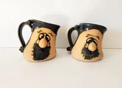 MADE POTTERY LEANING