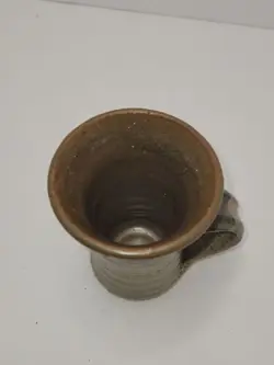SIGNED STONEWARE COFFEE