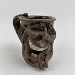 SCULPTURED CLAY POTTERY