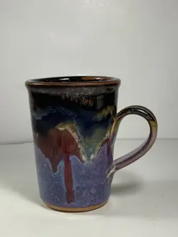 MUG IN.