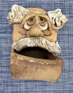STONEWARE POTTERY HAND