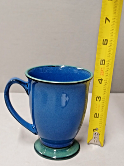 OF FOOTED MUGS