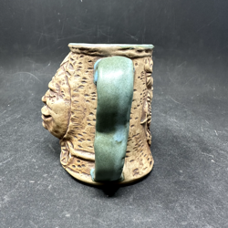 POTTERY FACE MUG