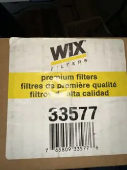 33577
